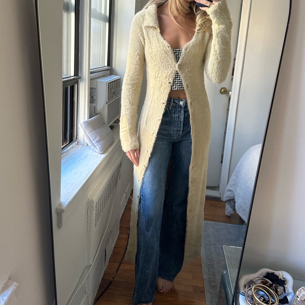 Long fuzzy sweater with button detail